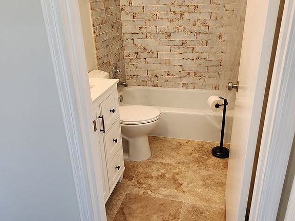 Custom Bath with Spanish Tile and Marble floor