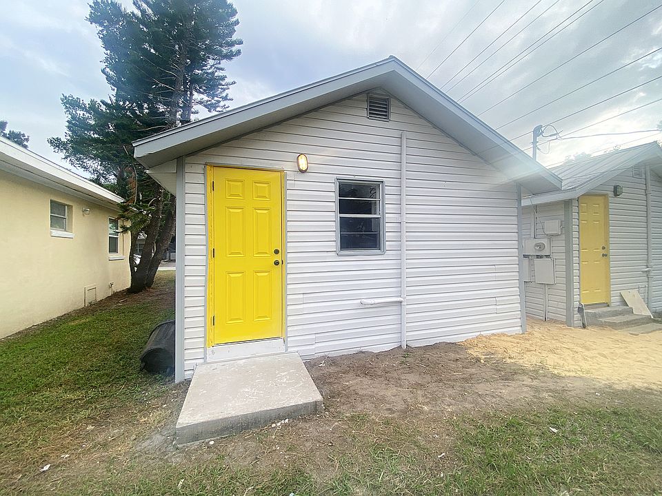 Rear entrance with open parking
