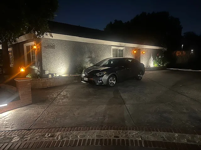 2 parking spots next to house, inside gated property