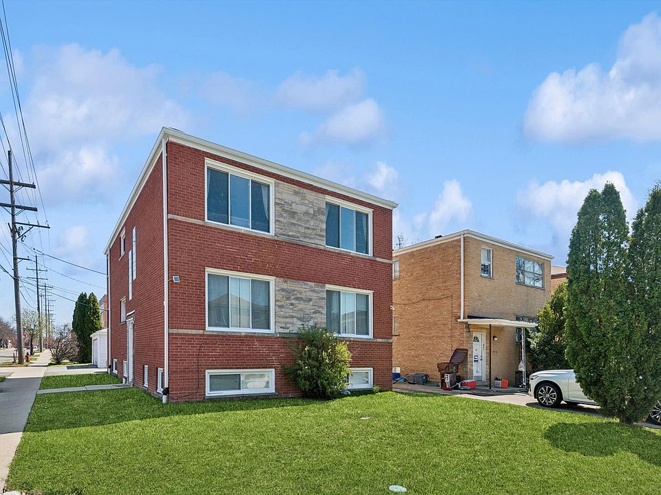 Front of building + side yard.