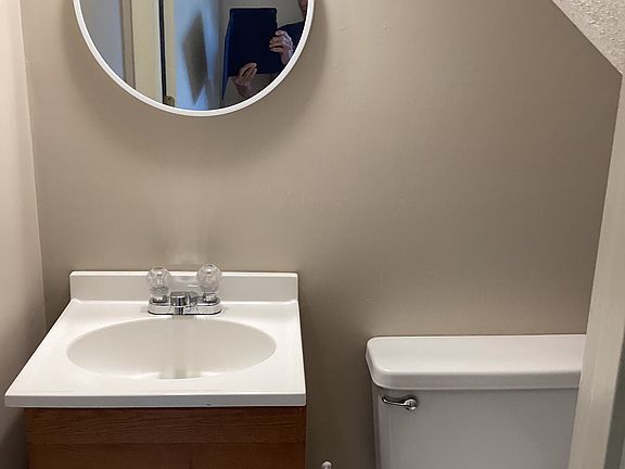 The half bathroom next to living room