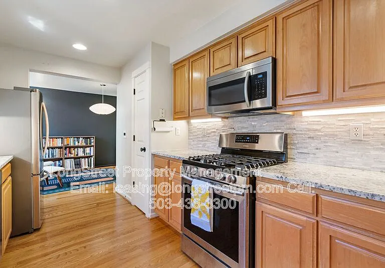 10247 NW Village Heights Dr — Photo 21