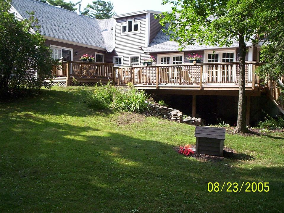 back view of house and deck