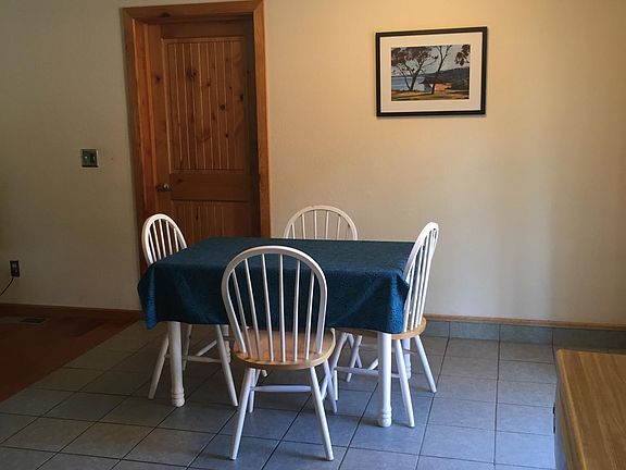 Dining off kitchen, looks out to backyard