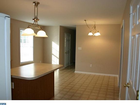 Large breakfast area overlooking private 1 acre lot