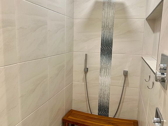 This is the shower that is included for tenant use only (private en suite bathroom inside the primary bedroom area).