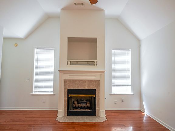 Living Room with gas fireplace & TV area
