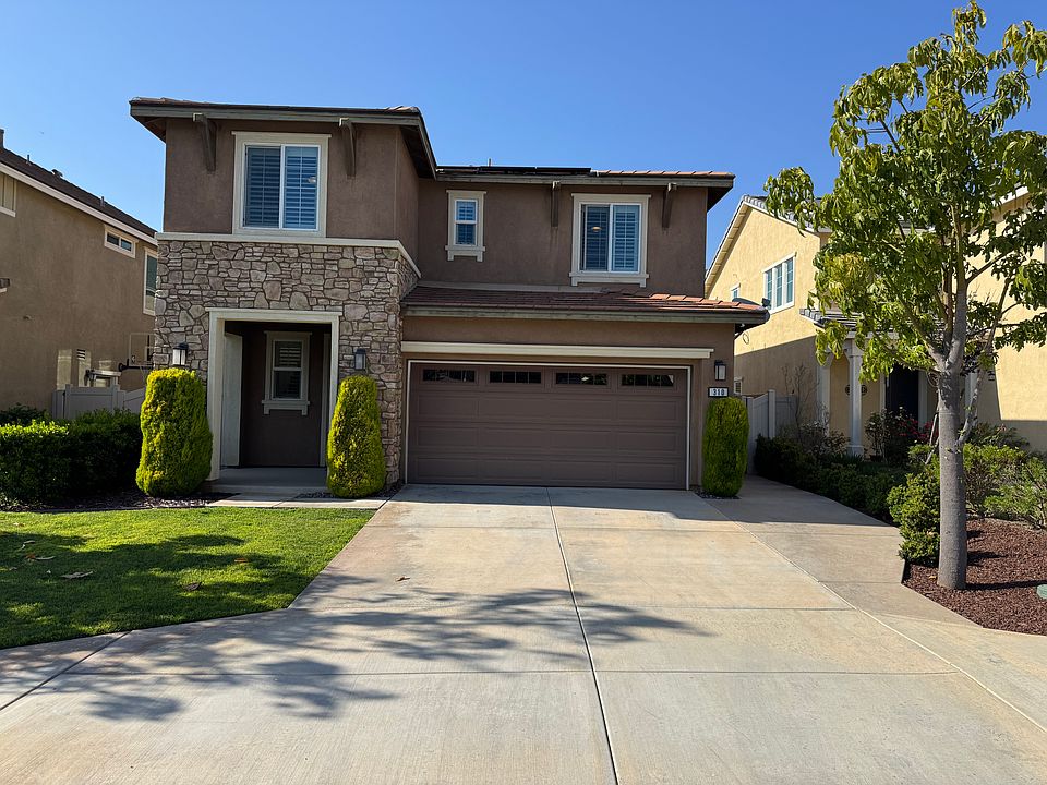 Front yard, two car garage