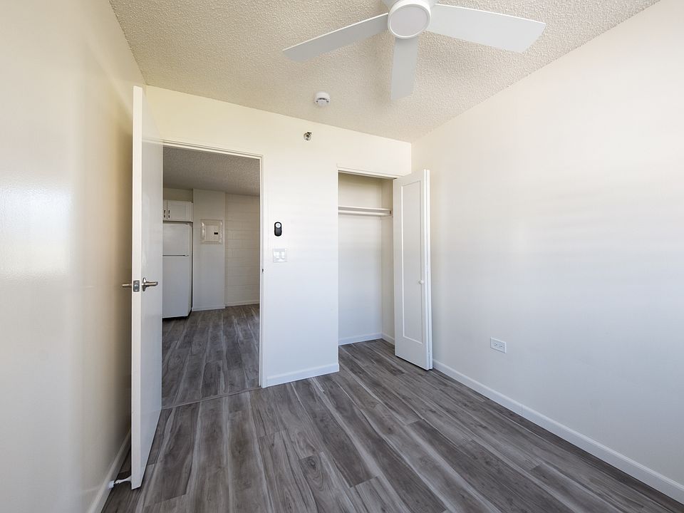Bedroom #1 features a ceiling fan and plenty of closet space.
