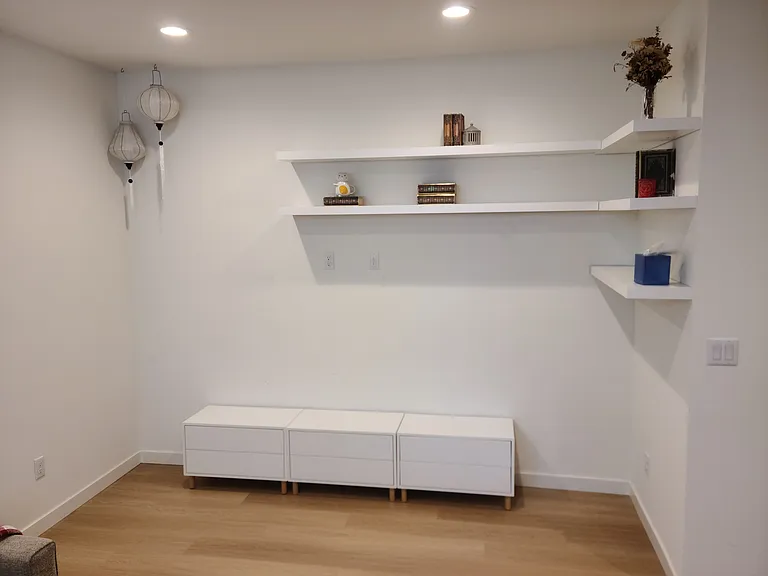 Living room, facing the interior wall.