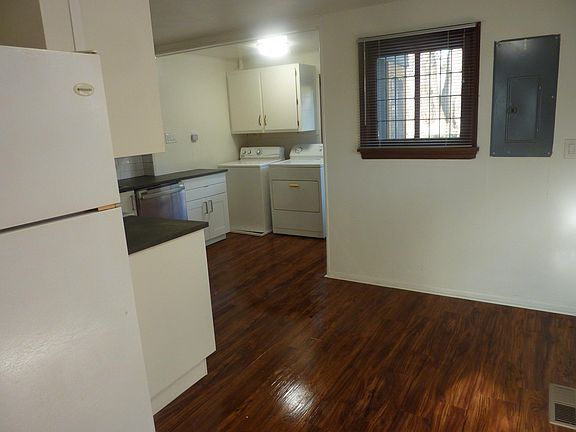Brand new Ikea kitchen, new hardiplank floor, laundry area
