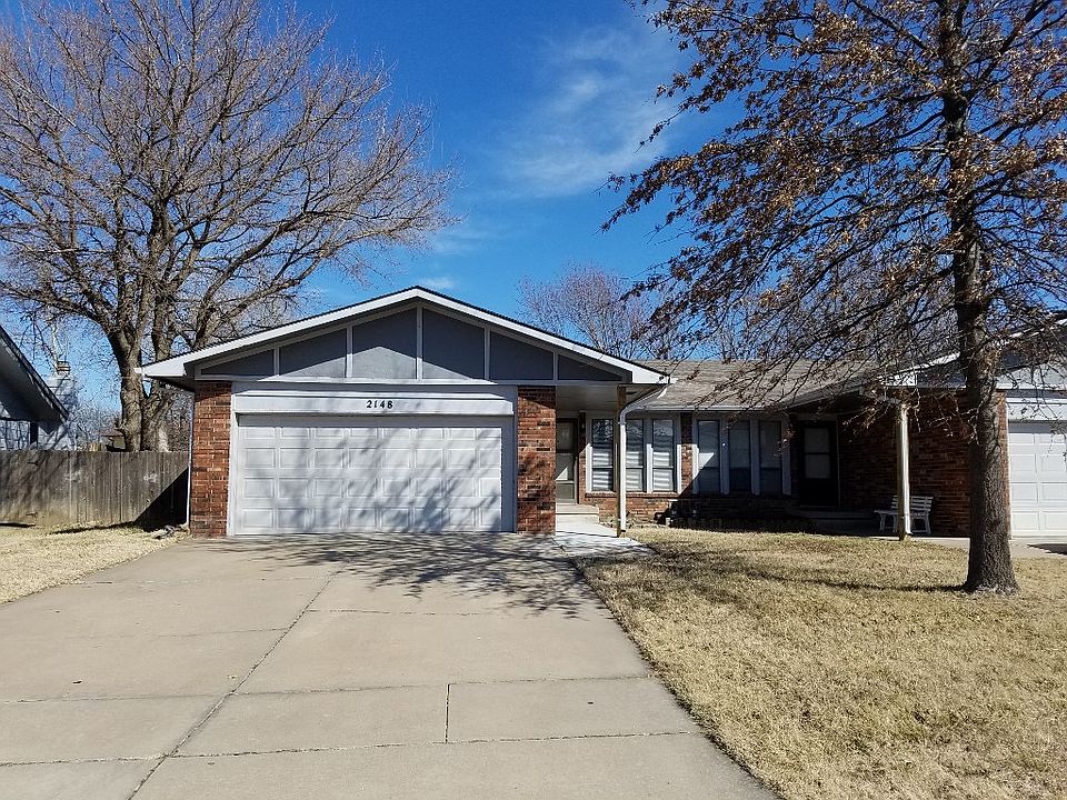 Two car garage and fenced yard