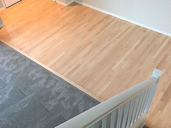 New Carpets and Newly refinished hardwood Floors