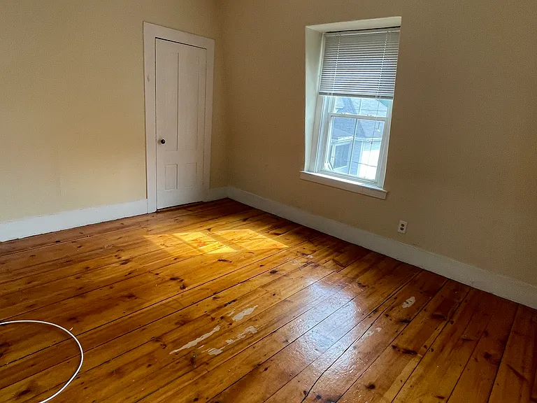 Front Bedroom - Flexible living/bedroom/bonus (note: no overhead light, floor lamps needed)
