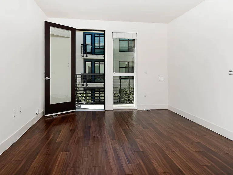 Living Room with Balcony and Hard Surface Flooring