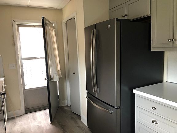 Kitchen pantry and refrigerator