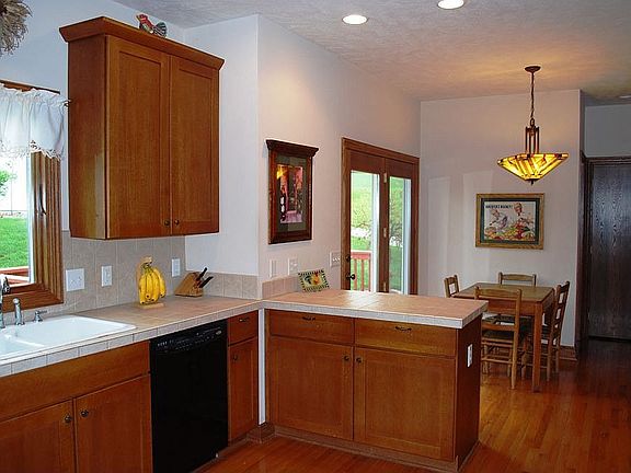 Eat-in kitchen leading out to the cedar deck
