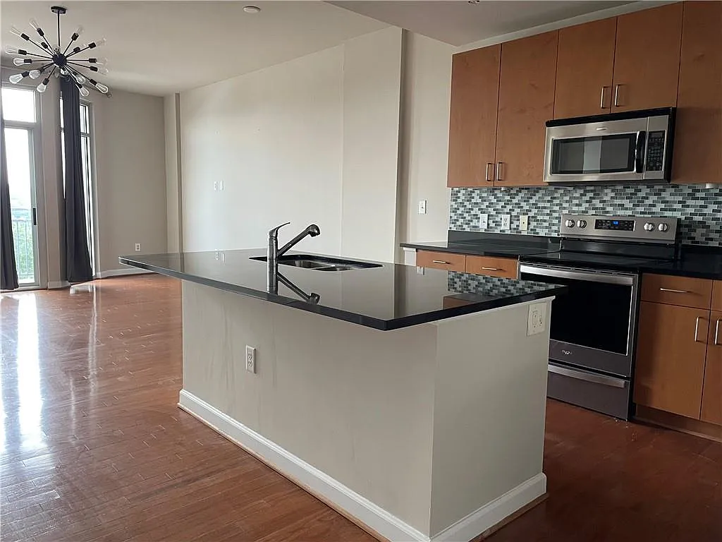 Building Photo - 711 Cosmopolitan Dr #723