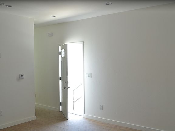 4th image of 10646 1/4 S Central Ave