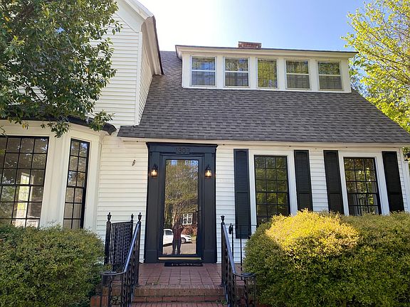 A quaint porch to sit and sip some of your favorite beverages
