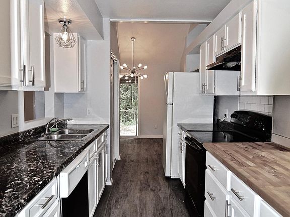 kitchen with a butcher block counter top