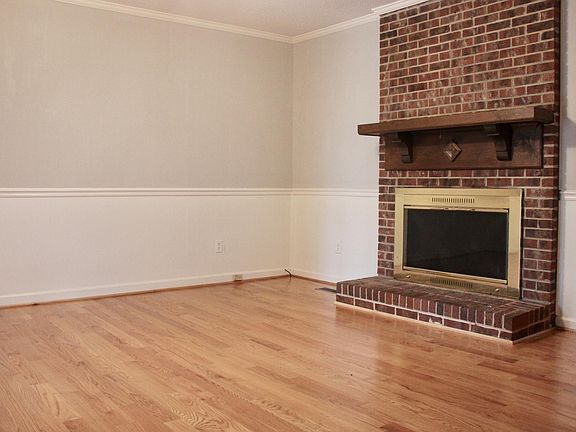 Family Room (approximately 14' x 13') with Decorative Fireplace