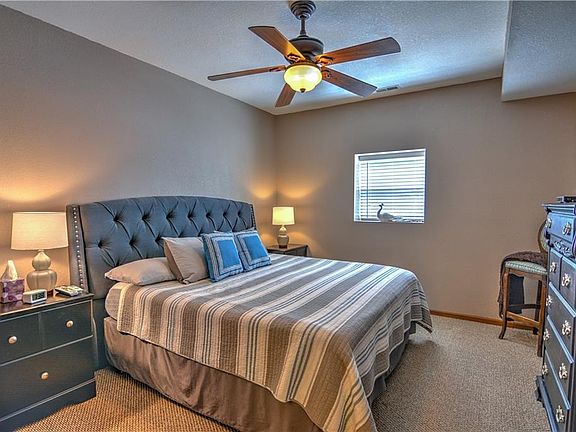The spacious master bedroom holds a walk-in closet and is on the lower floor.