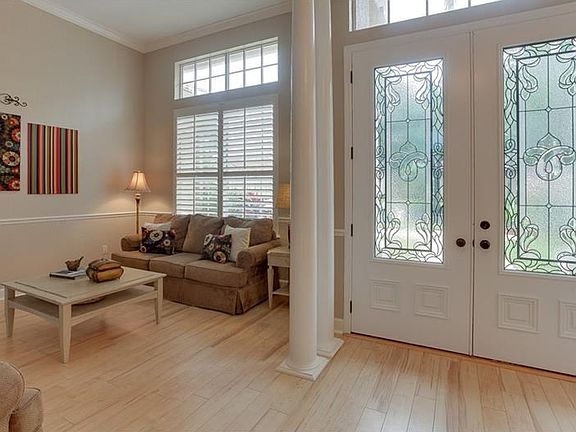 Double door entry with lead glass windows