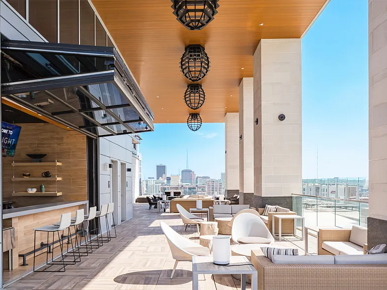 The indoor outdoor bar at Two Light Luxury Apartments