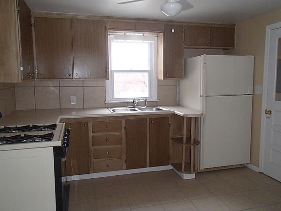Kitchen with gas stove.