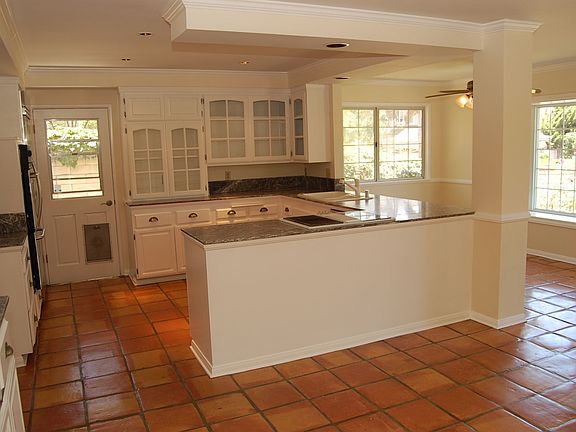 Gourmet Kitchen With Granite And Stainless Steel Appliances