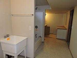 BASEMENT UTILITY ROOM AND BATHROOM