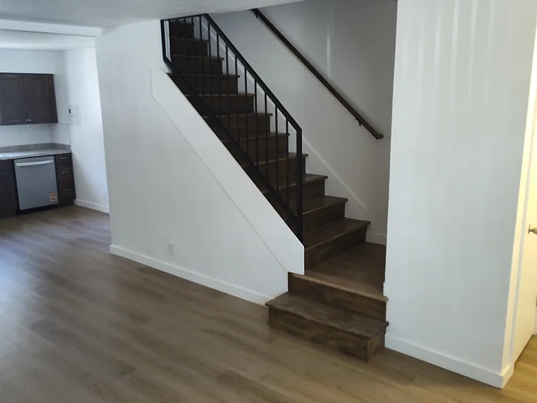 Standing in the living room