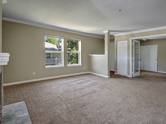 Living room w/1st bed/den