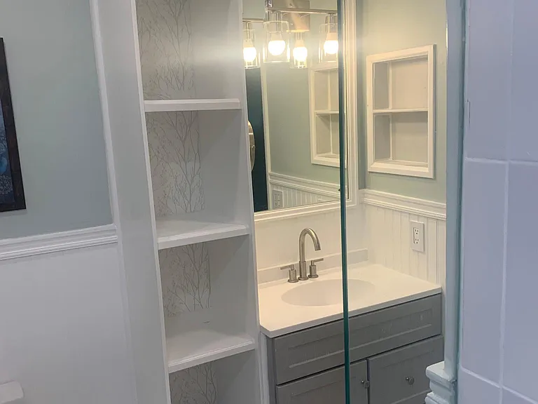 Master bath with built in extra cabniets