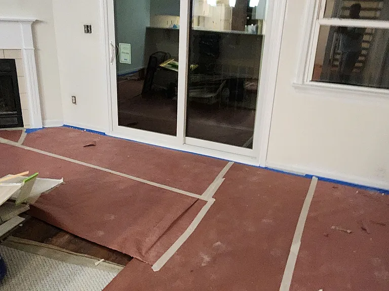 Livingroom with a new sliding glass door ready to be painted