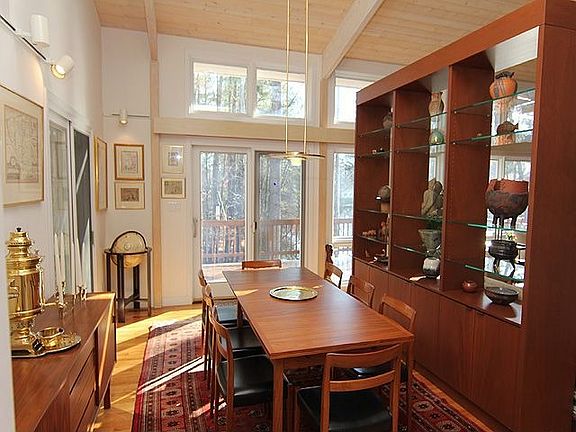 Dining room with mahogany room divider