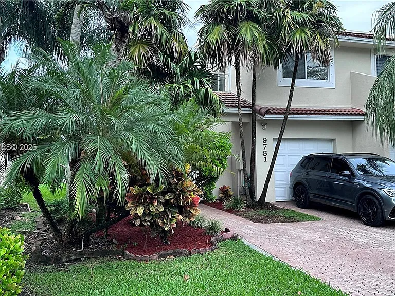 9781 NW 45th Ln — Photo 32