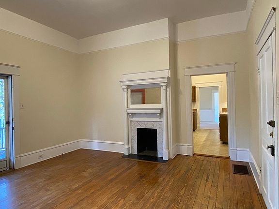 From the living room you can see through the kitchen into the large office/study and the bedroom beyond. Floor plan available on request.