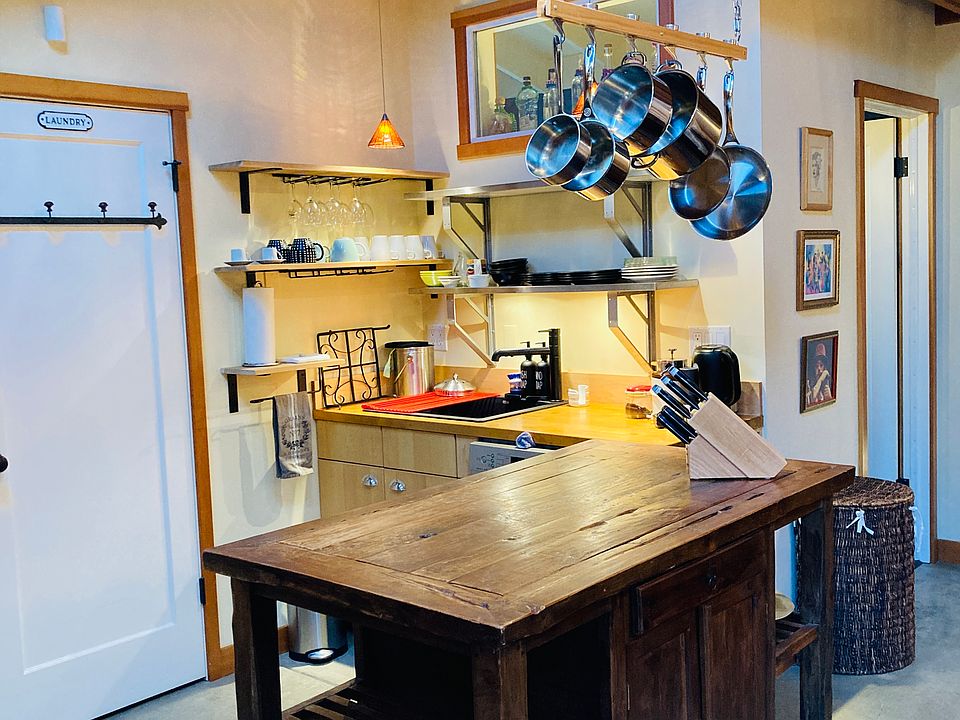 Laundry closet on left; kitchen sink & dishwasher