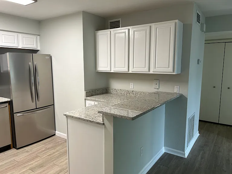 Freshly painter cabinets and new countertops just installed