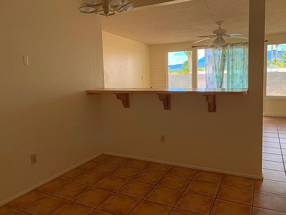Dining area - bonus: stool top area - great for enjoying views of the Rincon Mountains as it's own shadows begin to give it different appearances from afar as the day progresses and the sun passes over.