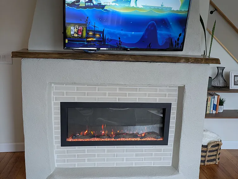 Electric fireplace with remote and heater