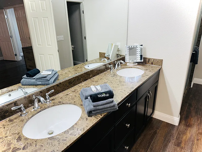 3rd Floor Master Bath has dual sinks, makeup mirror w/ magnification, shower, walk-in closet & more.
We provide towels & linens to get you started.