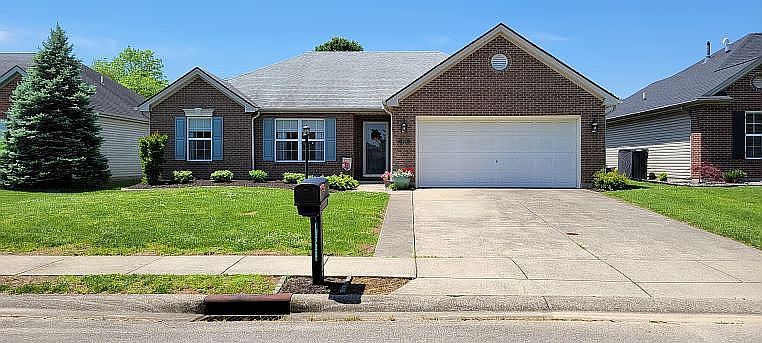 Front of home newly landscaped