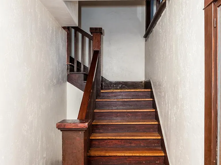 Common staircase to upstairs units.