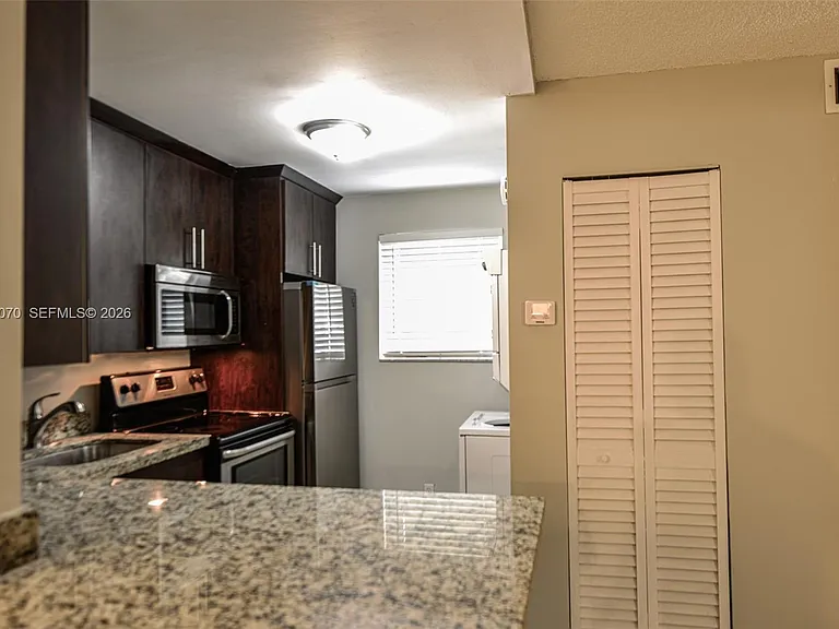 703 Gardens Dr #102 — Photo 5