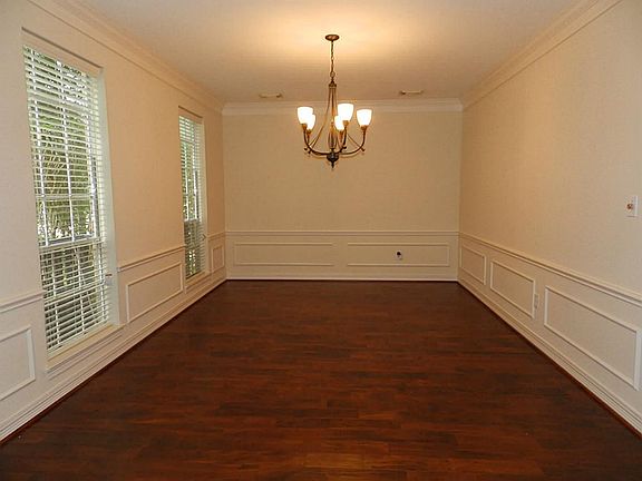 Formal Dining room featuring beautiful hand-scraped hardwood flooring.
