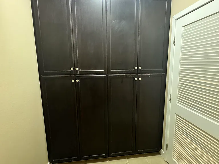 Laundry Room with ceiling height cabinets for ample storage