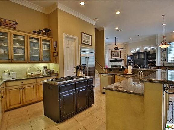 GOURMET, OPEN CONCEPT KITCHEN, GAS COOKTOP, DOUBLE OVENS, BUILT IN STAINLESS COUNTER DEPTH REFRIGERATOR, BREAKFAST BAR, WALK-IN PANTRY, TONS OF STORAGE READY FOR HOLIDAY GATHERINGS AND WEEKEND GET TOGETHERS.